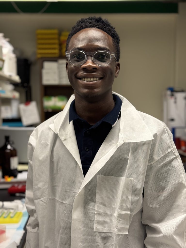 Triumph Okuku, M.S. Student